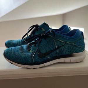 Women’s Nike Frees 5.0 size 7.5 shoes.